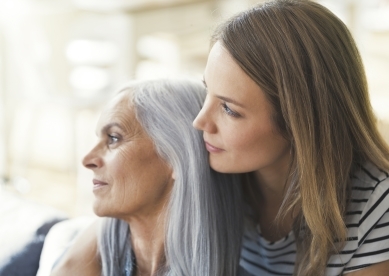 Mother and Adult Daughter Looking Away from Camera